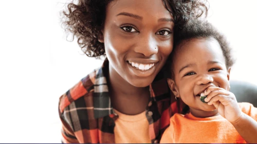 Happy mother and baby on a white background