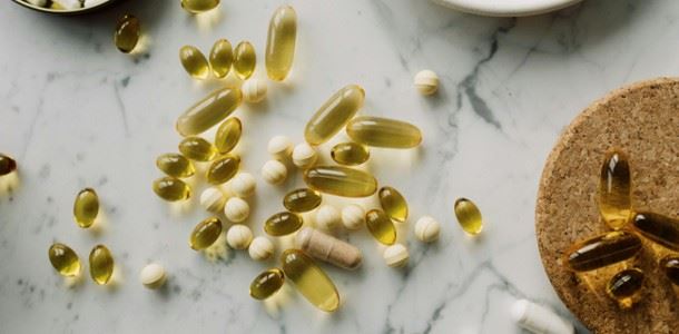 Diatary supplement pills on a desk