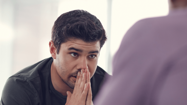 Man speaking with therapist 