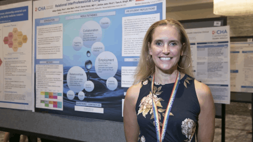 Allisyn Brady standing before her poster, 2021 Harvard Macy Program