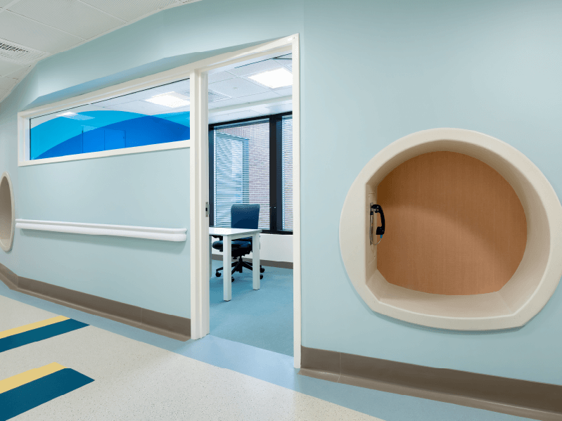 An open and bright consult room for patients and providers.
