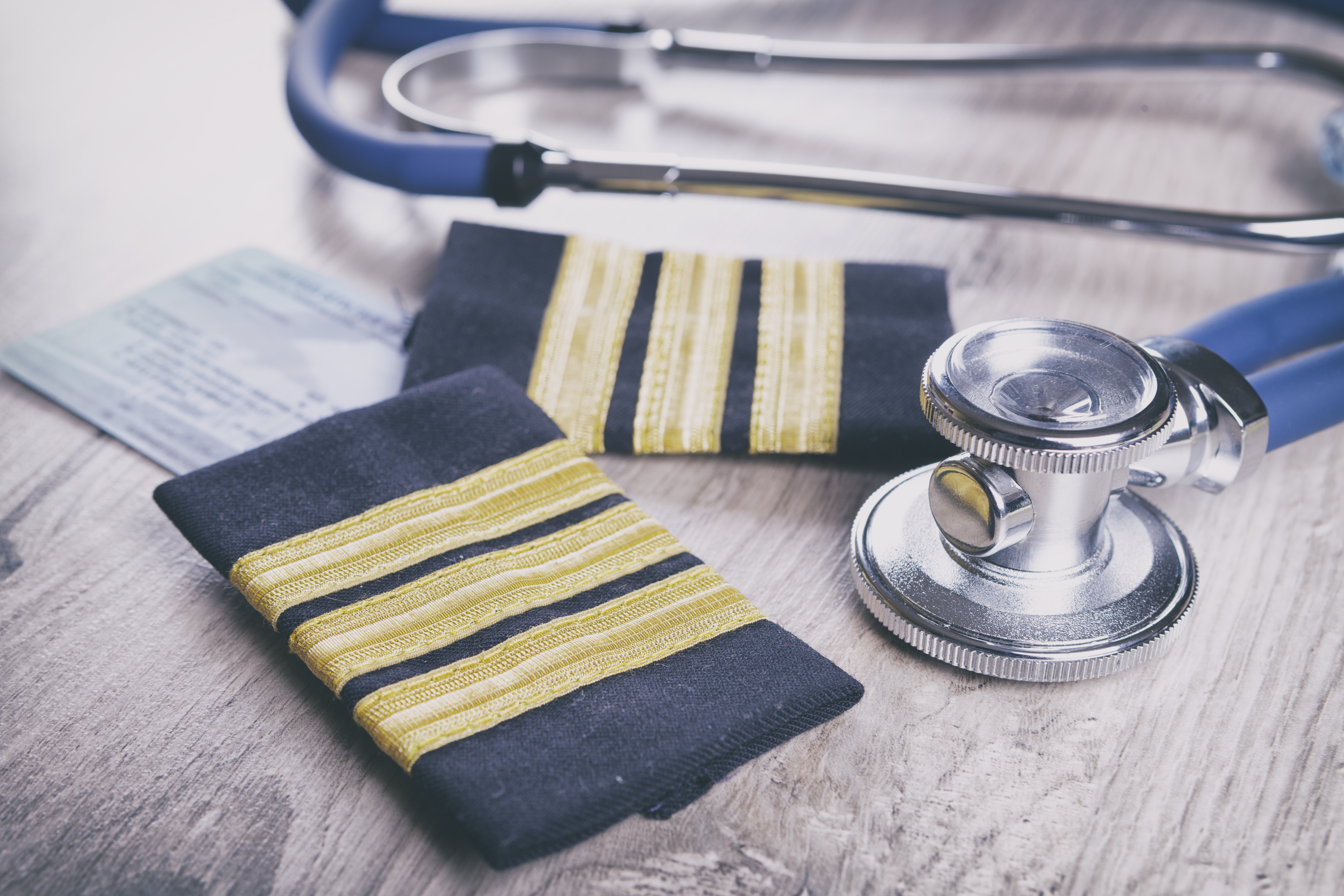 image of stethoscope and pilot captain arm bands